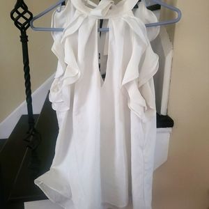 White/light ivory sleeveless beautiful ruffle top. Size small